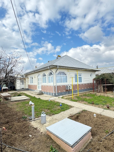 Casa cu 1.052 mp teren, SASCUT,  jud. Bacau